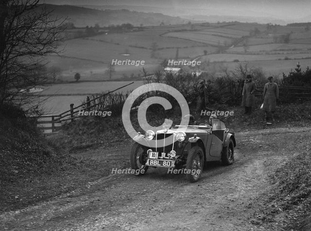 MG TA of JES Jones of the Cream Cracker Team at the MG Car Club Midland Centre Trial, 1938. Artist: Bill Brunell.
