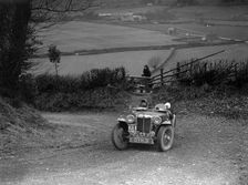 MG TA of JF Kingham competing in the MG Car Club Midland Centre Trial, 1938. Artist: Bill Brunell