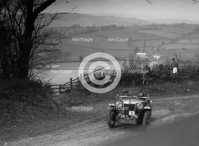 MG TA of JL Lutwyche competing in the MG Car Club Midland Centre Trial, 1938. Artist: Bill Brunell.