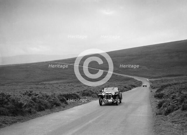 MG TA of JW Appleby, winner of a premier award at the MCC Torquay Rally, July 1937. Artist: Bill Brunell.