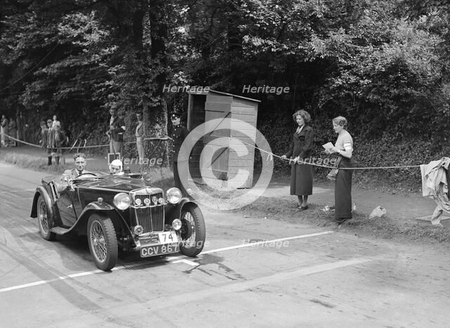 MG TA of JW Appleby at the MCC Torquay Rally, July 1937. Artist: Bill Brunell.