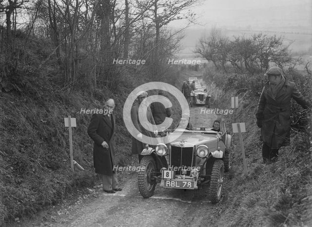 MG TA of Maurice Toulmin of the Cream Cracker Team at the MG Car Club Midland Centre Trial, 1938. Artist: Bill Brunell.