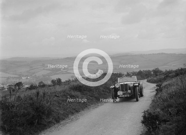MG TA of NH Grove competing in the MCC Torquay Rally, 1938. Artist: Bill Brunell.