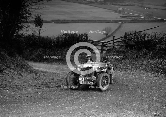 MG TA of NH Grove competing in the MG Car Club Midland Centre Trial, 1938. Artist: Bill Brunell.