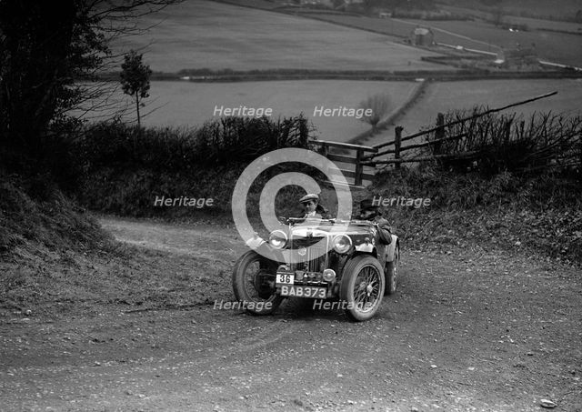 MG TA of NH Grove competing in the MG Car Club Midland Centre Trial, 1938. Artist: Bill Brunell.