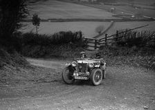 MG TA of NH Grove competing in the MG Car Club Midland Centre Trial, 1938. Artist: Bill Brunell