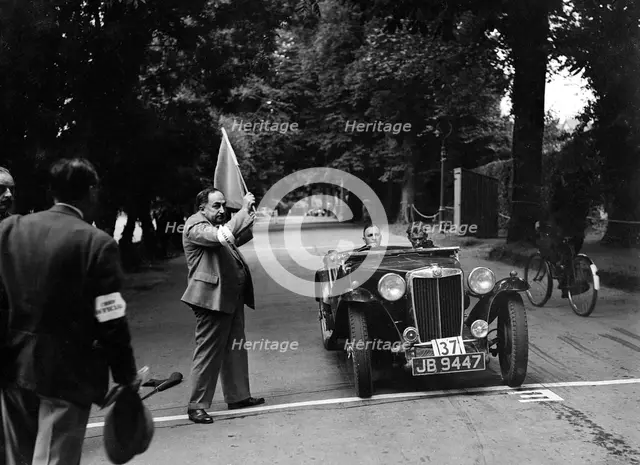 MG TA of RA MacDermid, winner of a bronze award at the MCC Torquay Rally, July 1937. Artist: Bill Brunell.