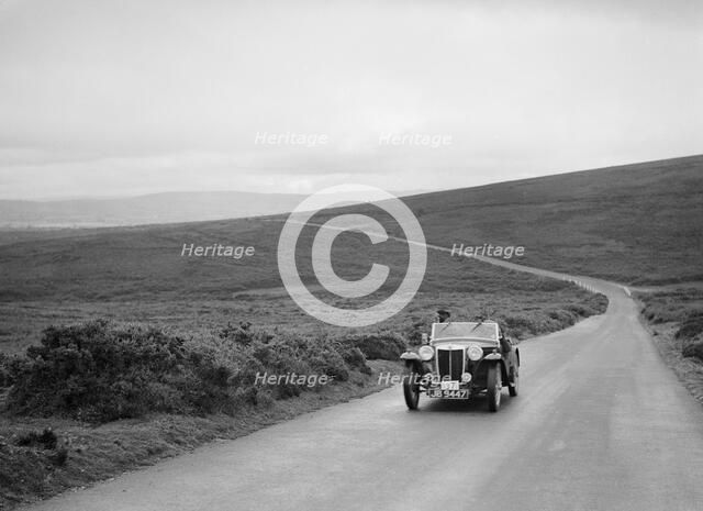 MG TA of RA MacDermid, winner of a bronze award at the MCC Torquay Rally, July 1937. Artist: Bill Brunell.