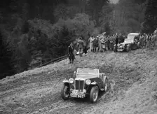 MG TA of RE Rushbrook competing in the MCC Edinburgh Trial, Roxburghshire, Scotland, 1938. Artist: Bill Brunell