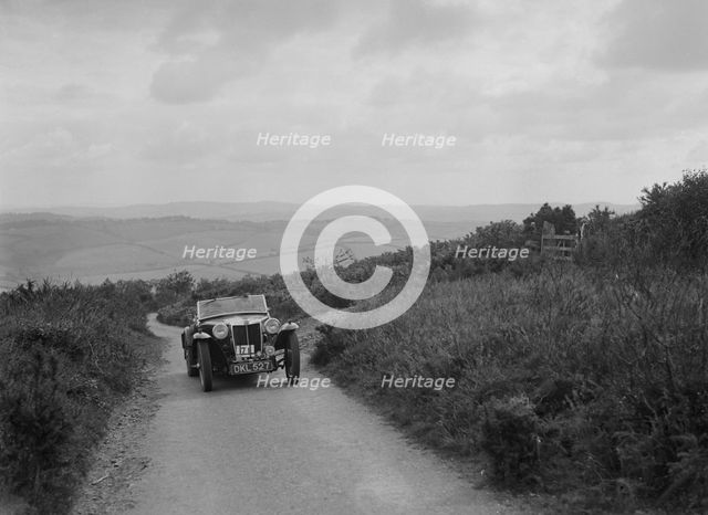 MG TA of WC Kendrick competing in the MCC Torquay Rally, 1938. Artist: Bill Brunell.