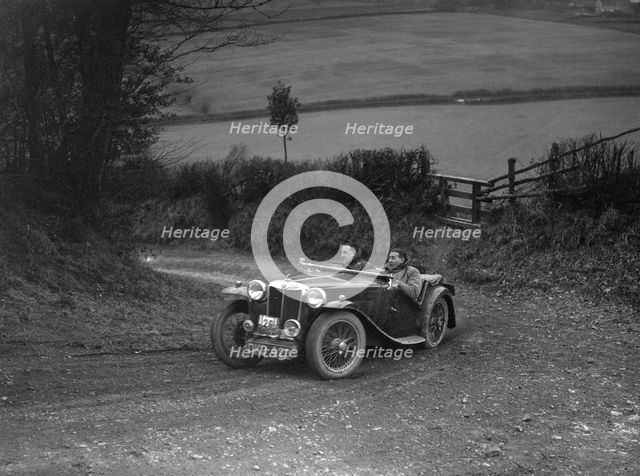 MG TA of WH Depper competing in the MG Car Club Midland Centre Trial, 1938. Artist: Bill Brunell.