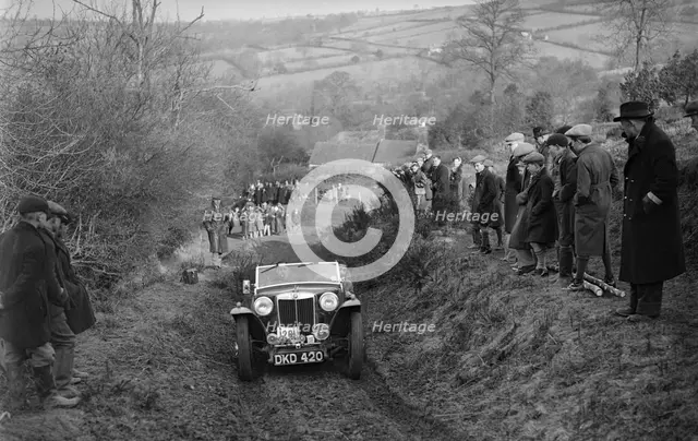 MG TA of WH Depper competing in the MG Car Club Midland Centre Trial, 1938. Artist: Bill Brunell.
