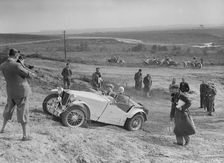 MG TA of the Cream Cracker Team competing in the Great Weat Motor Club Trial, 1938. Artist: Bill Brunell