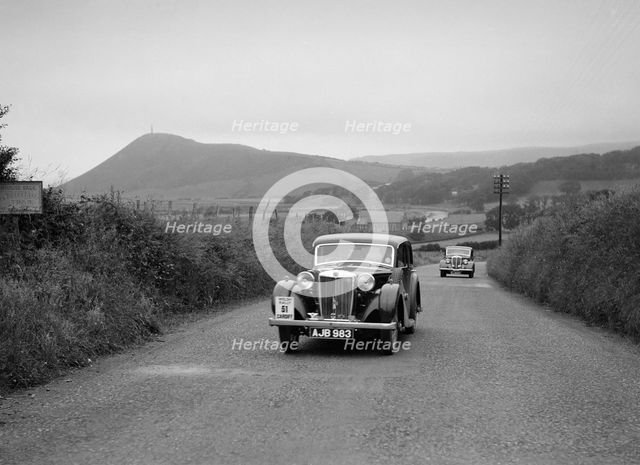 MG VA of RK Wellsteed ahead of a Wolseley saloon at the South Wales Auto Club Welsh Rally, 1937 Artist: Bill Brunell.