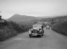 MG VA of RK Wellsteed ahead of a Wolseley saloon at the South Wales Auto Club Welsh Rally, 1937 Artist: Bill Brunell