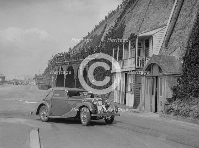 MG VA Tickford tourer of Lilian Roper competing in the RAC Rally, Madeira Drive, Brighton, 1939. Artist: Bill Brunell.