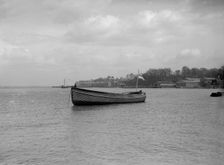 Mitcham motor launch Border Pride No3 at anchor, 1912. Creator: Kirk & Sons of Cowes