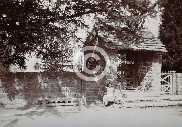 Mitchel Troy, Wales: lich-gate and stocks outside the church, c1890. Creator: Unknown.