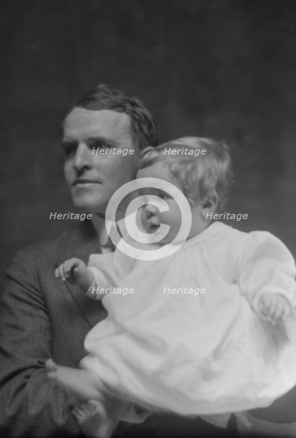 Mitchell, W.C., Mr., and baby, portrait photograph, 1914 May 22. Creator: Arnold Genthe.