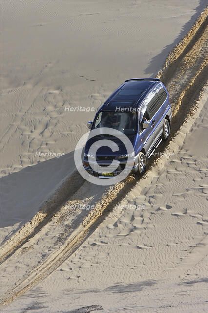 Mitsubishi Delica Space Gear V6 1996 in sand dunes New South Wales Australia Artist: Unknown.