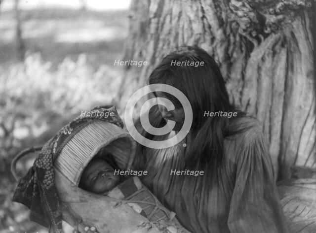 Mizheh and babe, c1906. Creator: Edward Sheriff Curtis.