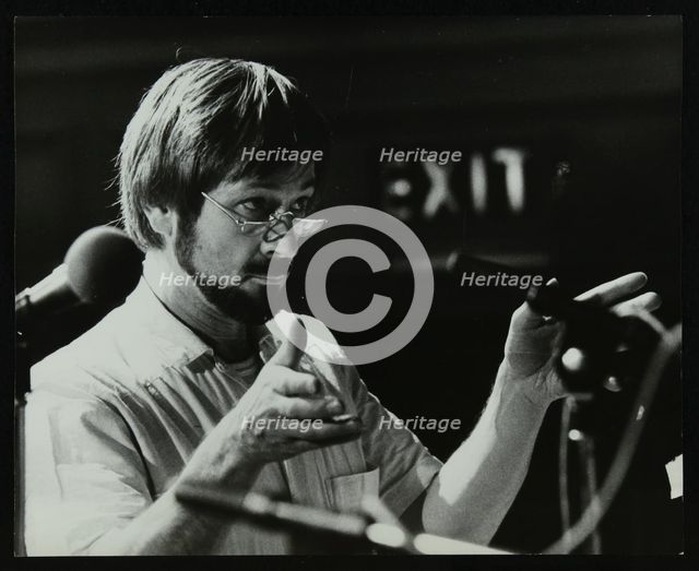 Michael Garrick conducting an orchestra at Berkhamsted Civic Centre, 1985. Artist: Denis Williams