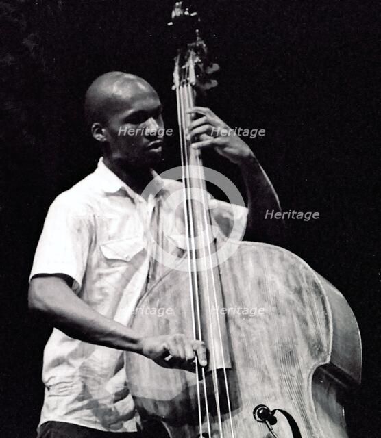 Michael Olatuja, Brecon Jazz Festival, Powys, Wales, 2003. Artist: Brian O'Connor