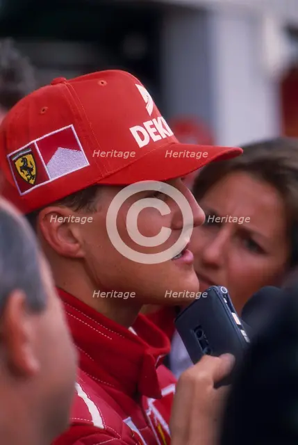 Michael Schumacher being interviewed, British Grand Prix, Silverstone, Northamptonshire, 1997. Artist: Unknown
