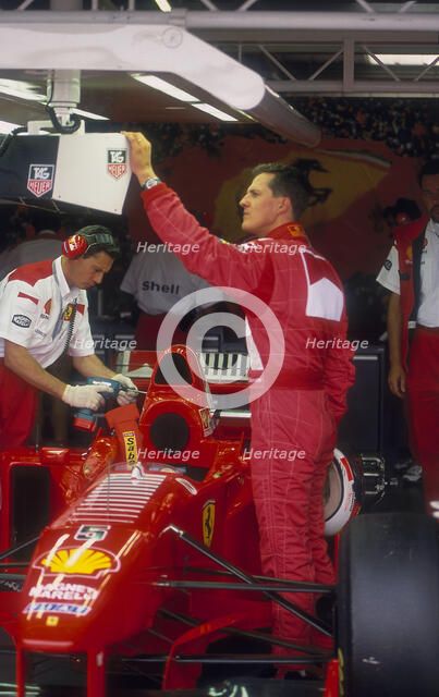 Michael Schumacher with Ferrari, British Grand Prix, Silverstone, Northamptonshire, 1997. Artist: Unknown