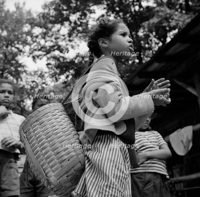 Michailyn calling her buddie Marie at Camp Fern Rock, Bear Mountain, New York, 1943 Creator: Gordon Parks.