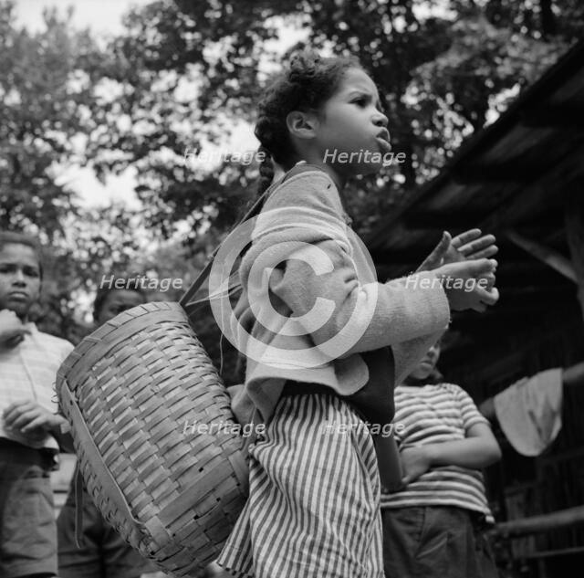Michailyn calling her buddie Marie at Camp Fern Rock, Bear Mountain, New York, 1943 Creator: Gordon Parks.