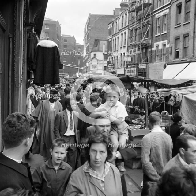 Middlesex Street, part of Petticoat Lane Market, Whitechapel, London, c1946-c1959. Creator: John Gay.