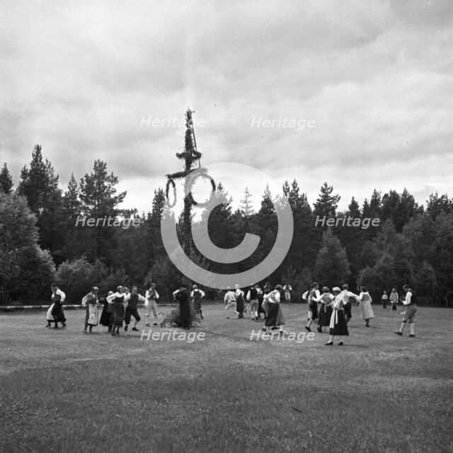 Midsummer celebrations at Mullsjo, Sweden, 1950. Creator: Unknown.