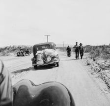 Migratory family arriving at grower's camp for pickers, Imperial Valley, California, 1939. Creator: Dorothea Lange