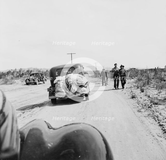 Migratory family arriving at grower's camp for pickers, Imperial Valley, California, 1939. Creator: Dorothea Lange.
