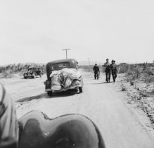 Migratory family arriving at grower's camp for pickers, Imperial Valley, California, 1939. Creator: Dorothea Lange