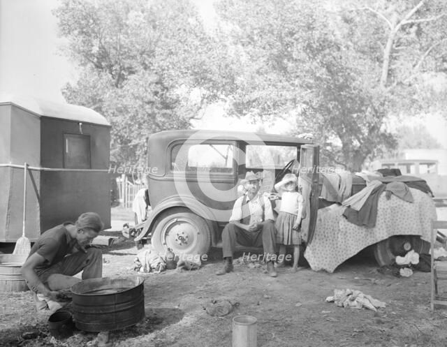 Migratory family in auto camp, California, 1936. Creator: Dorothea Lange.