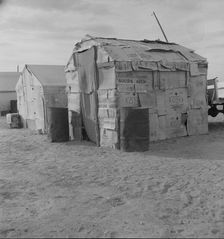Migratory field worker's home on the edge of a pea field, Imperial Valley, California, 1937. Creator: Dorothea Lange