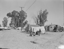 Migratory labor housing during carrot harvest, near Holtville, Imperial Valley, California , 1939. Creator: Dorothea Lange