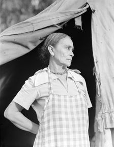 Migratory woman, Greek, living in a cotton camp near Exeter, California, 1936. Creator: Dorothea Lange
