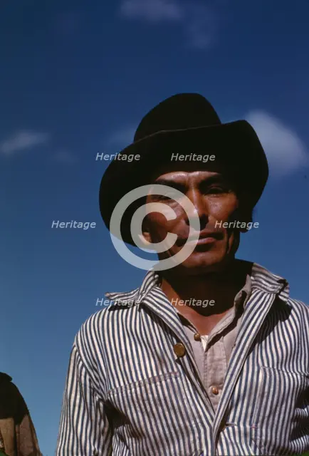 Migratory worker, FSA ... camp, Robstown, Tex., 1942. Creator: Arthur Rothstein.