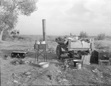 Migratory workers "kitchen" near Shafter, Kern County, California, 1936. Creator: Dorothea Lange