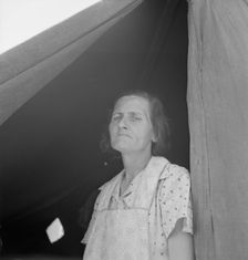 Migrant woman from Arkansas living in contractor's camp near Westley, California, 1939. Creator: Dorothea Lange
