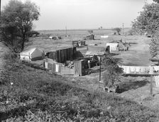 Migrant camp on the outskirts of Sacramento, California on the American River, 1936. Creator: Dorothea Lange