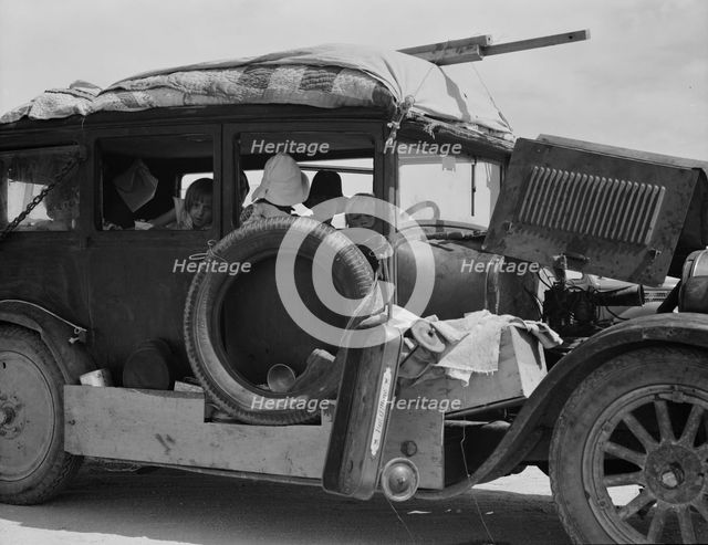 Migrant drought refugee family stalled on an Arizona highway, between Yuma and Phoenix, 1937. Creator: Dorothea Lange.