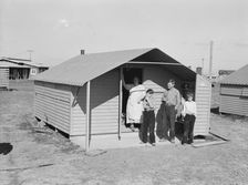 Migrant family from Oklahoma, first occupants of Westley camp, California, 1939. Creator: Dorothea Lange