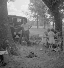 Migrant family from Oklahoma in Texas, alongside the road, 1936. Creator: Dorothea Lange