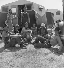 Migrant family in Farm Security Administration camp, Westley, California, 1938. Creator: Dorothea Lange