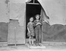 Migrant family in Kern County, California, 1936. Creator: Dorothea Lange