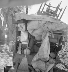 Migrant family outfit on U.S. 99 between Bakersfield, California, and the Ridge, 1939. Creator: Dorothea Lange